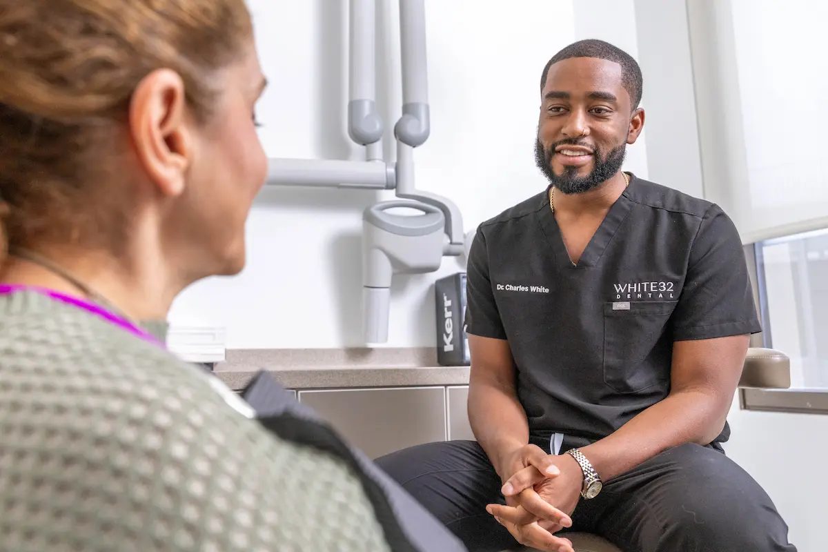 Dr. White in consultation with a patient